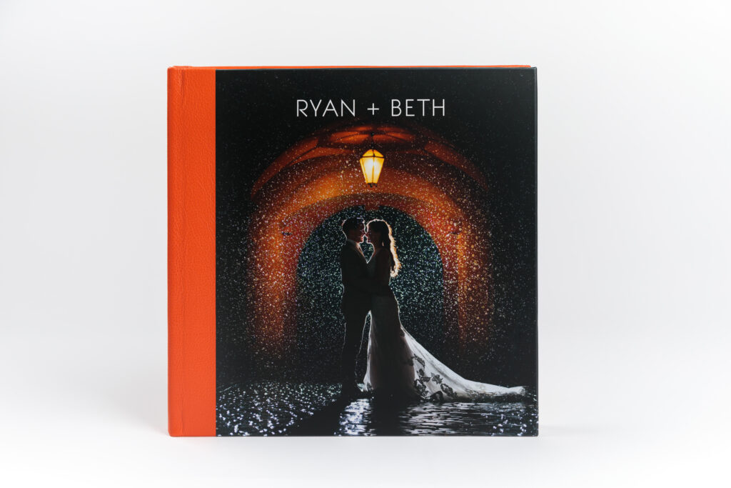 Professional wedding album with a creative image on the cover.